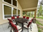 covered patio with table and chairs seats 8